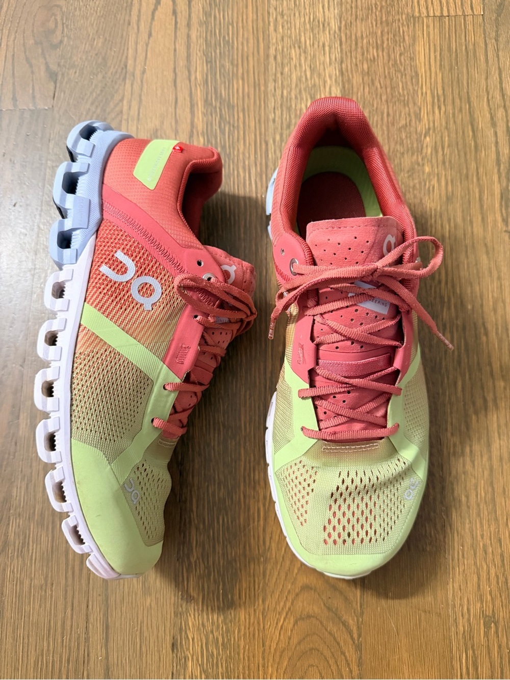 On Women's Cloudflow running shoes in the Guava and Dustrose colorway